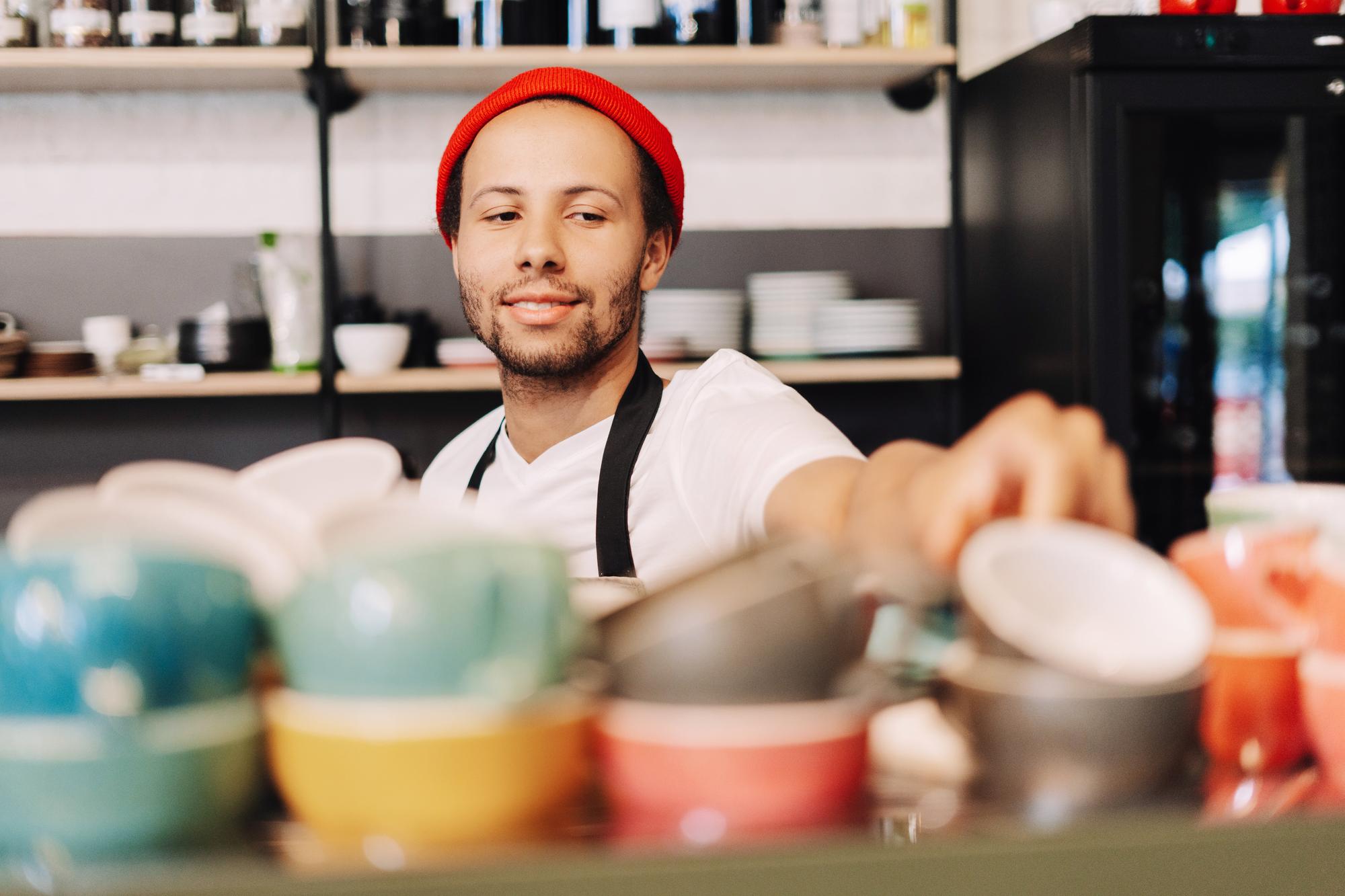 Portrait of operations lead handling ingredients